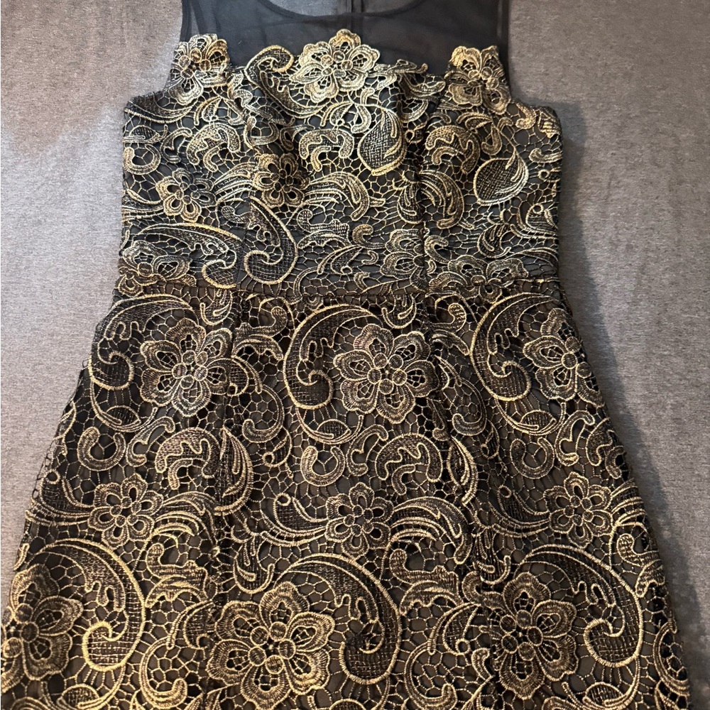 Brand Decide 1.8  Elegant Black and Gold Lace Dress